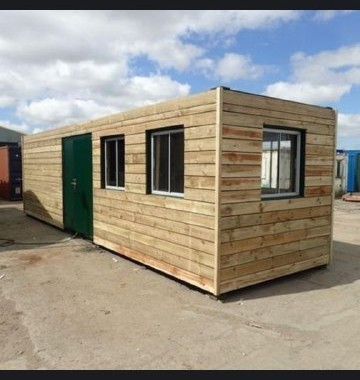 Timber-clad modular building on site